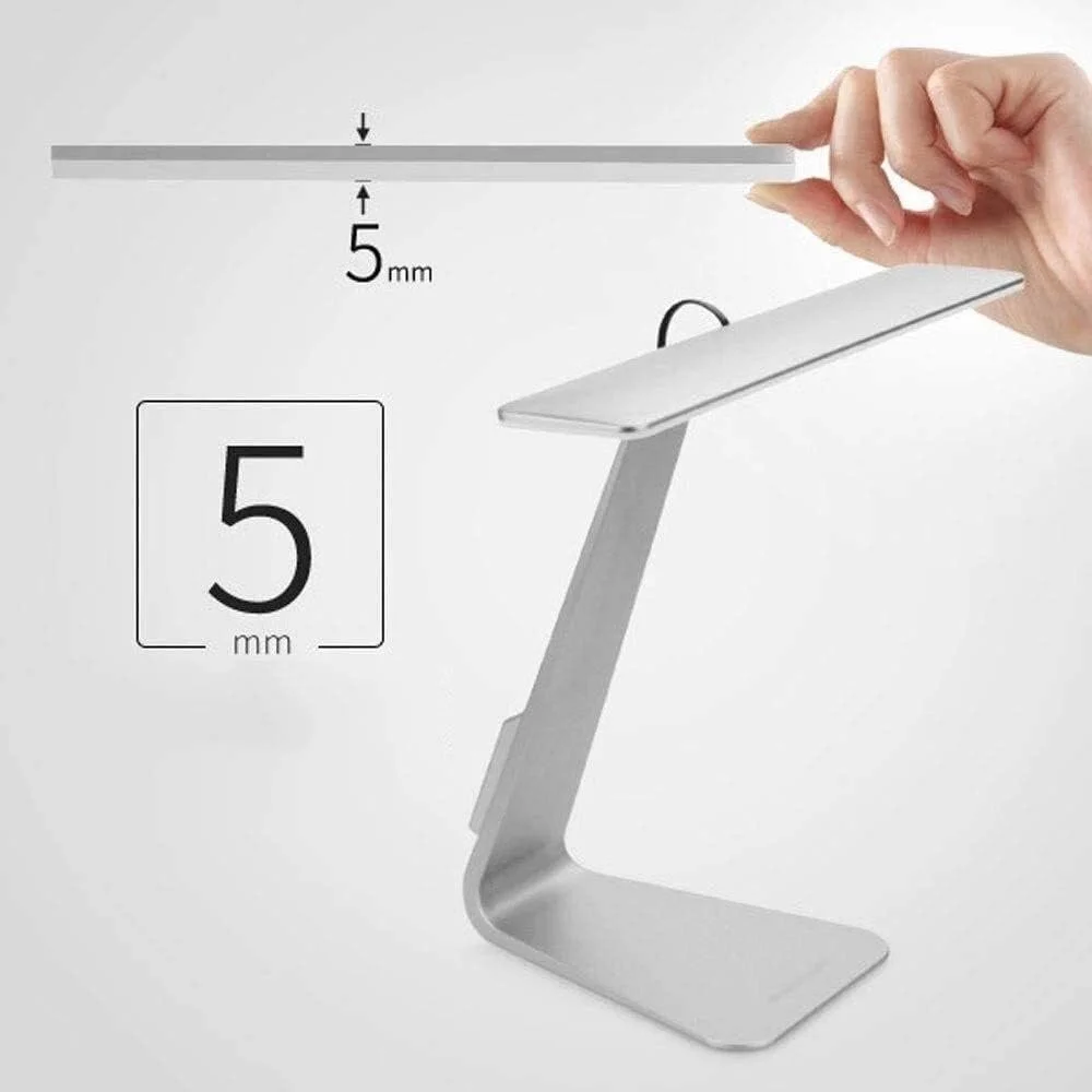 Adatun LS-8908 LED Desk Lamp powered by a laptop, showing its USB connection