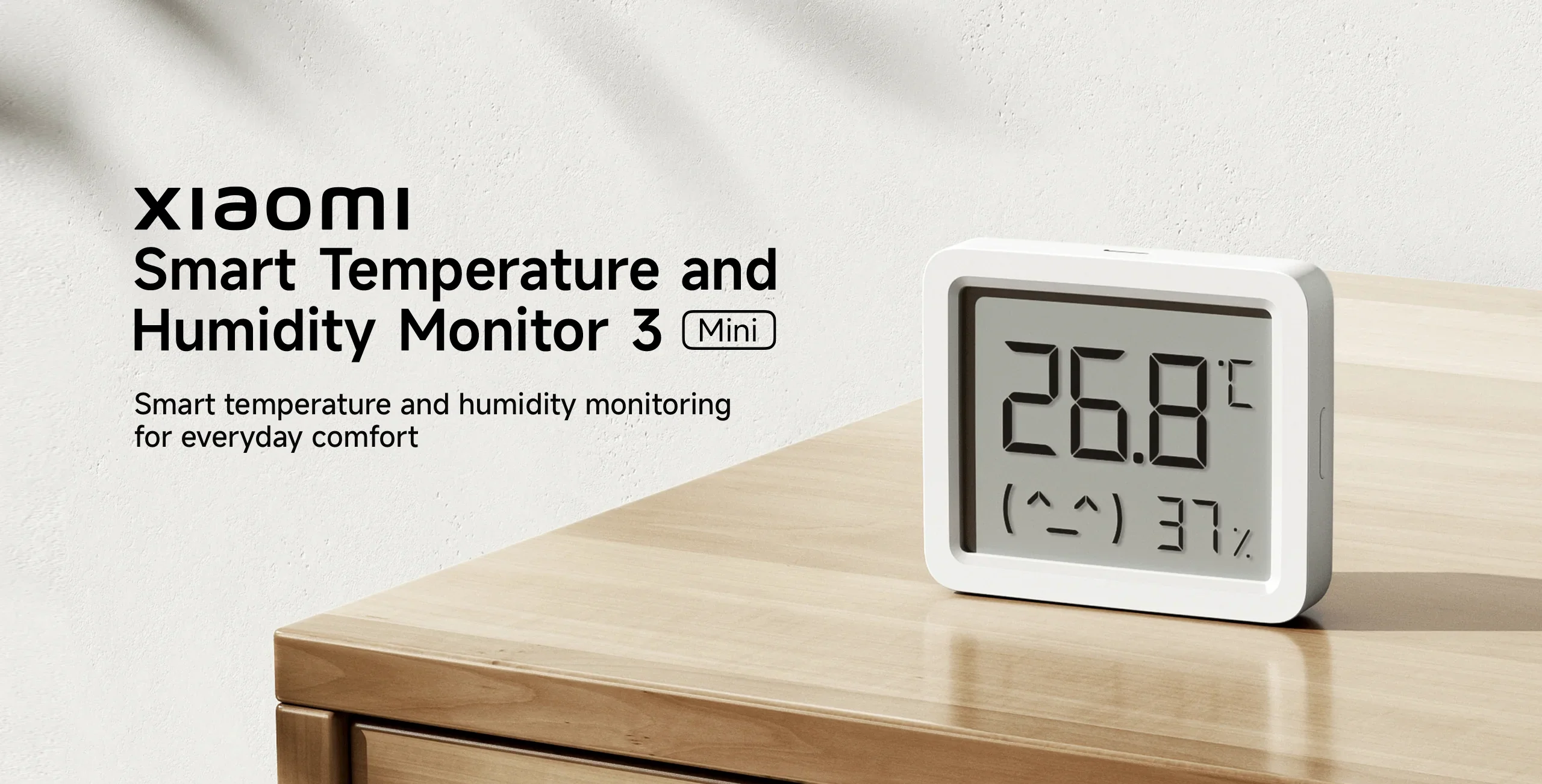 Xiaomi Smart Temperature and Humidity Monitor 3 Mini on desk