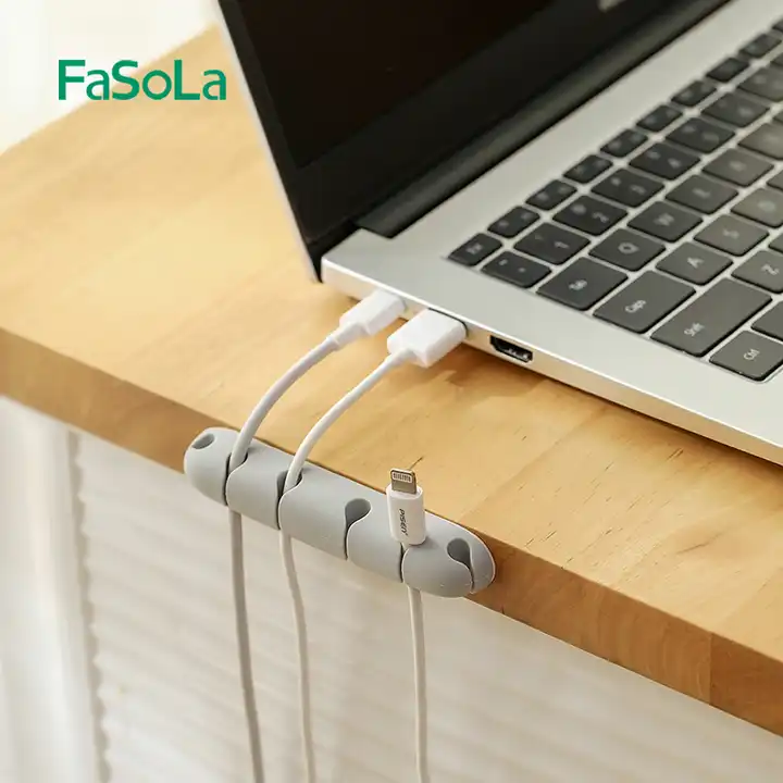 FaSoLa YF-156 Cable Management Button attached to a desk, showing its self-adhesive back